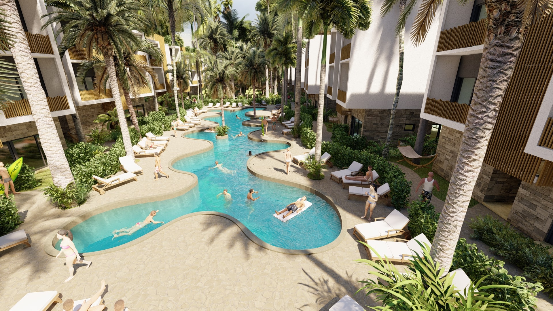 Elevated view of lagoon pool between Vela Paje apartment buildings with swimmers, sun loungers, and palm trees