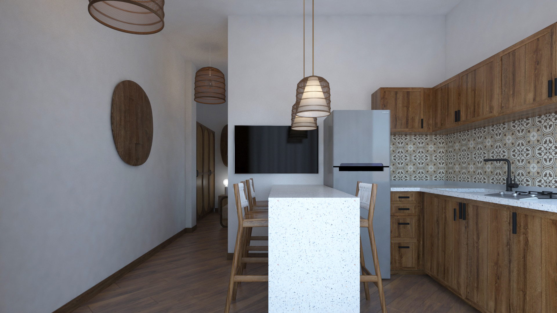 Open-plan kitchen with terrazzo island, woven pendant lamps, and patterned tile backsplash in Bahari Studio
